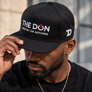 Model wearing The Don Flat Bill Cap